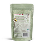 Back Green Nutworks Milk Chocolate Sultanas packaging of a snack with a label Nutritional information on a white background