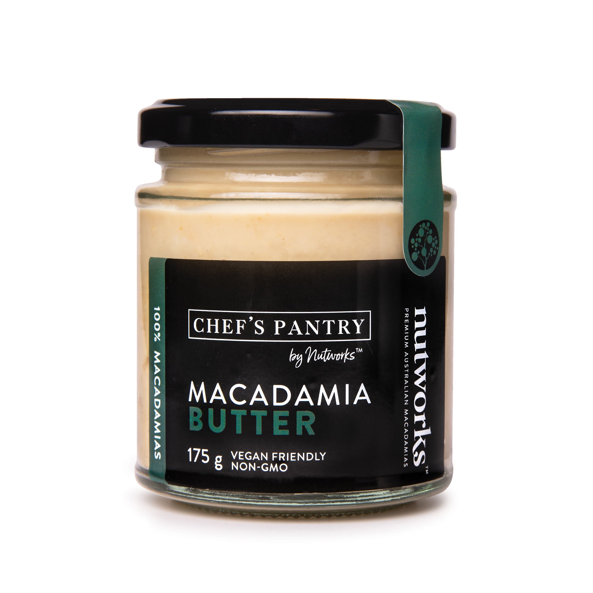 A jar of Chef's Pantry Macadamia Butter with the label showing the product name and weight of 175g. The jar is sealed with a black lid and has a vegan friendly and non-GMO icon.