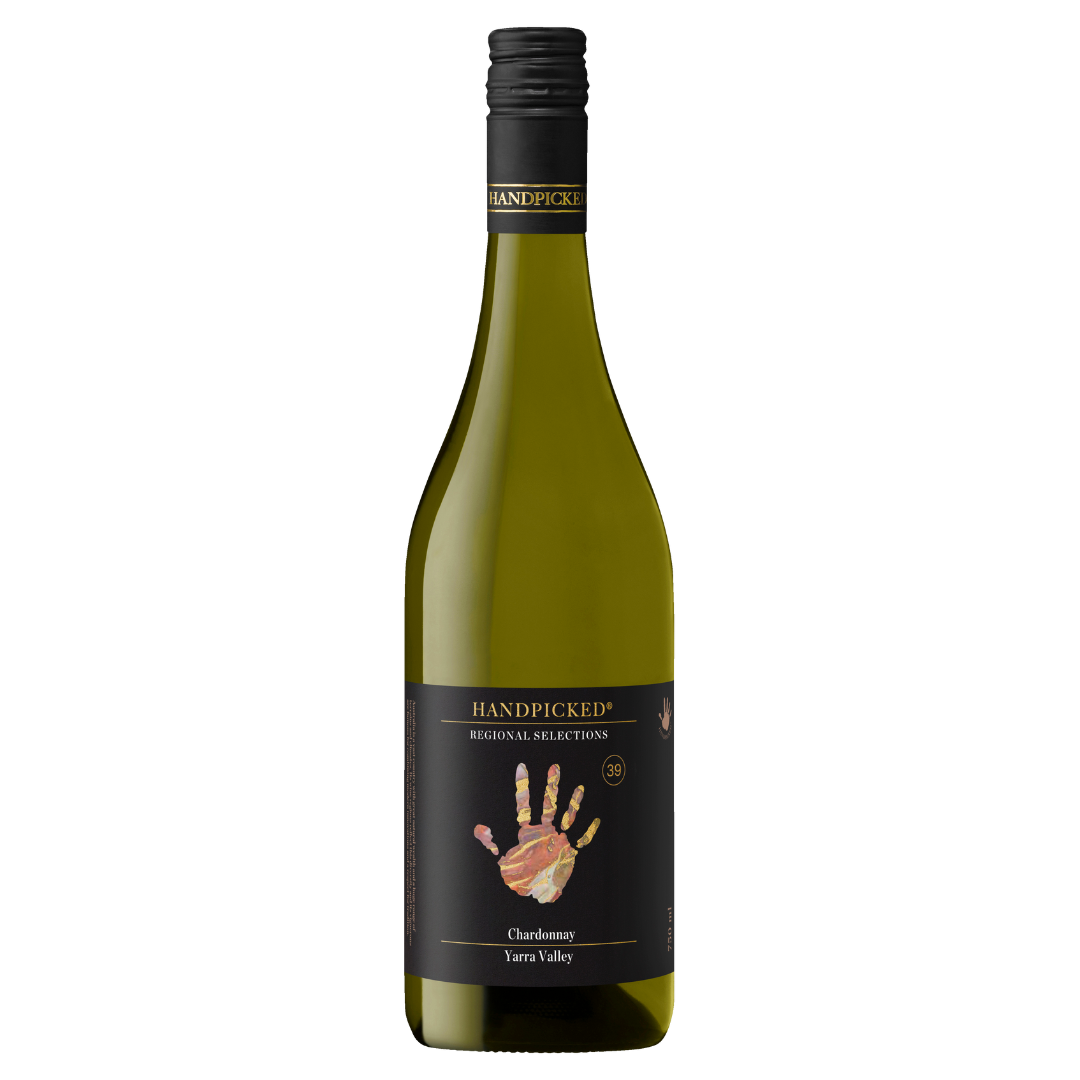 A bottle of Handpicked Yarra Valley Chardonnay with a label showing a hand and text indicating the wine variety and region.