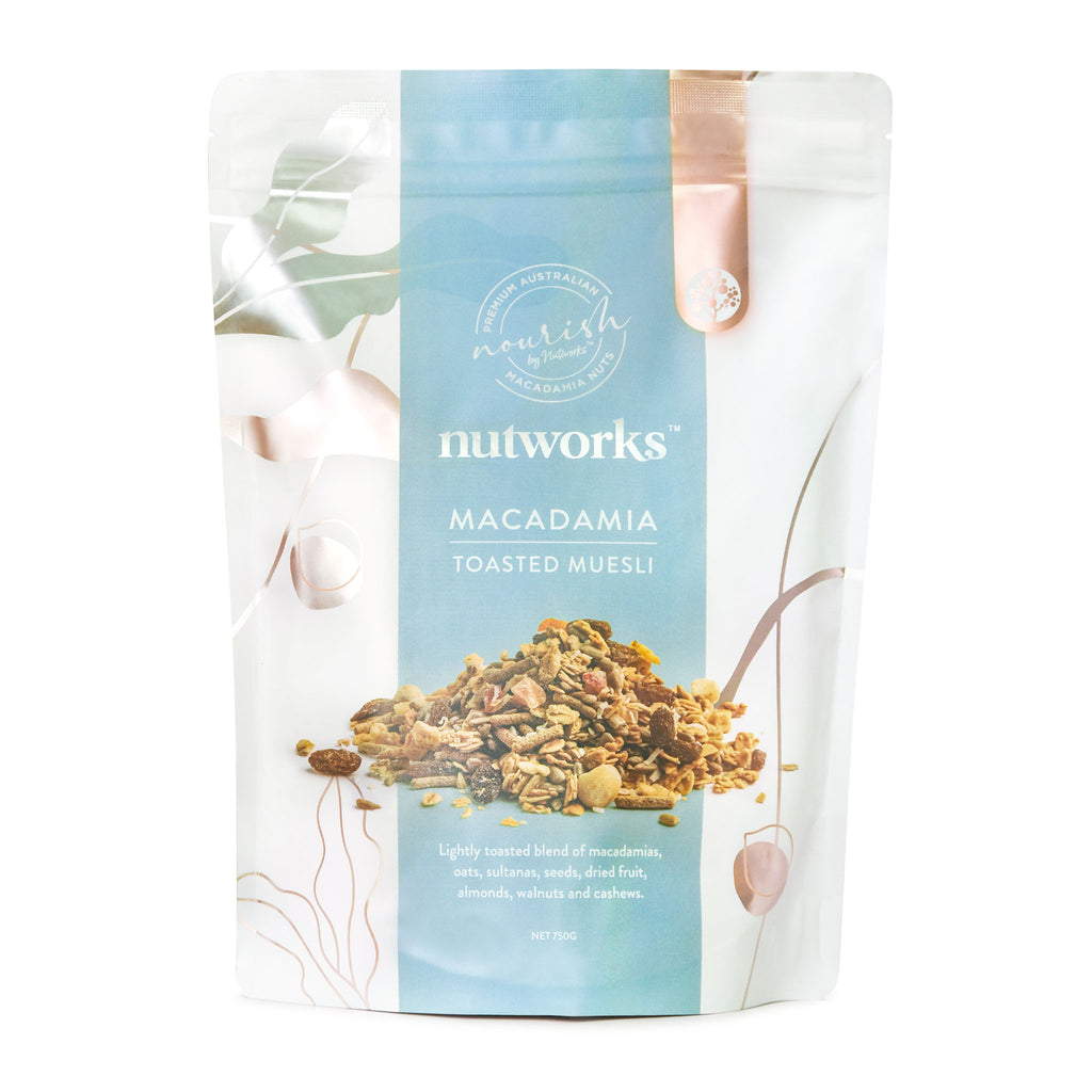 750g Packaging of Nutworks Toasted Macadamia Muesli showing the product and brand name with a floral design.