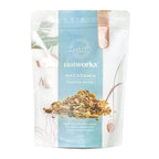 750g Packaging of Nutworks Toasted Macadamia Muesli showing the product and brand name with a floral design.