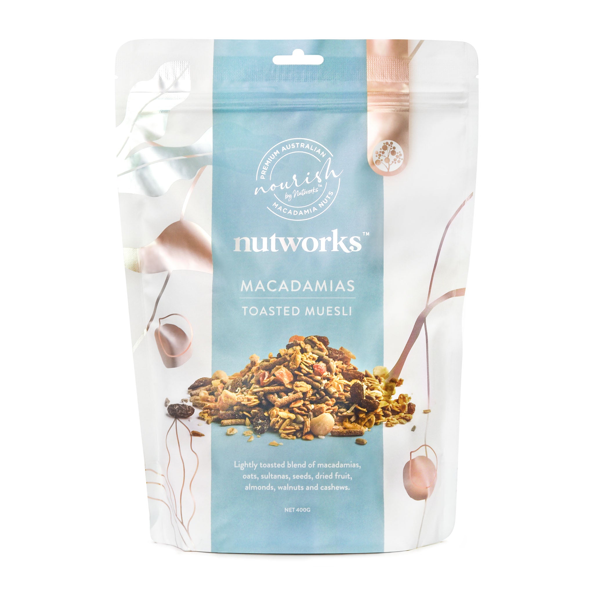 Packaging of Nutworks Toasted Macadamia Muesli 400g, showing the product and brand name with a floral design.
