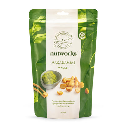 200g Packaging of Nutworks Wasabi premium Australian macadamias displaying the nuts and wasabi sauce with a green foliage background.